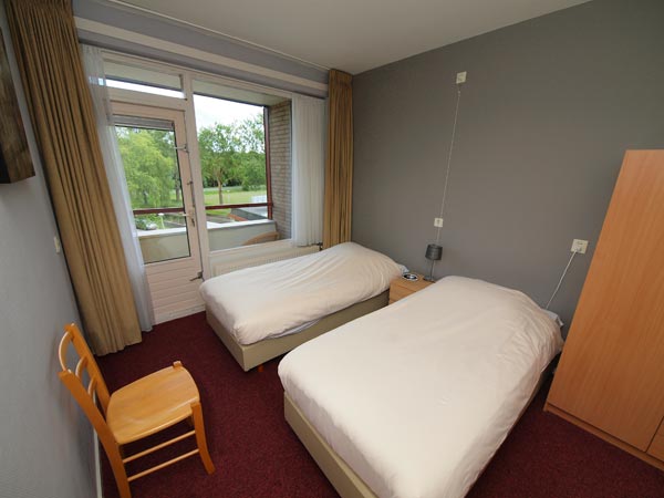 Bijna alle kamers van Holland Inn hebben een living.